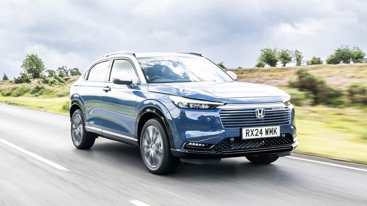 2024 Honda HR-V EX-L in Aegean Blue Metallic front three-quarter view