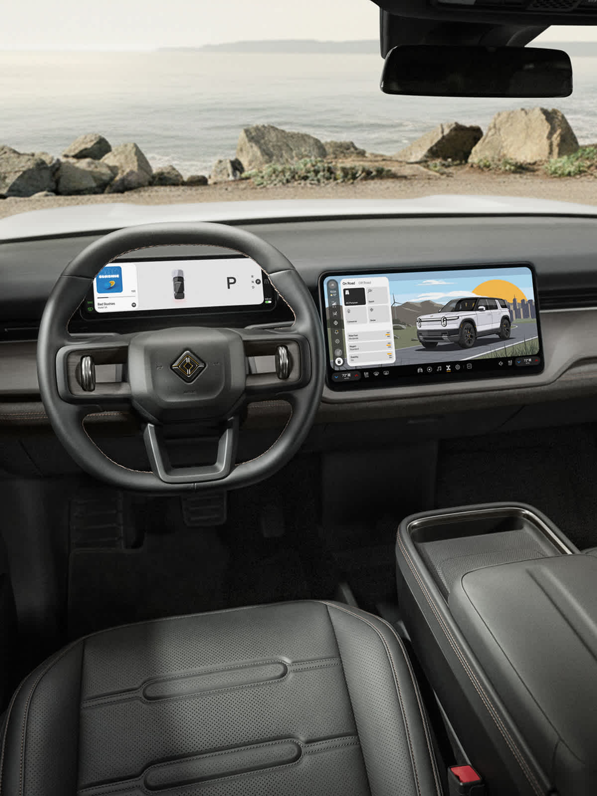 Official Rivian image of the R2 interior showing the dashboard, front seats, and center display