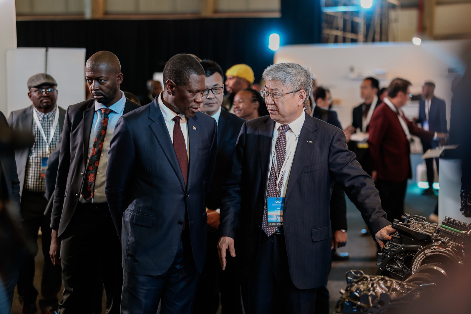 South African Deputy President Paul Mashatile and Chery chairman Yin Tongyue touring an exhibit