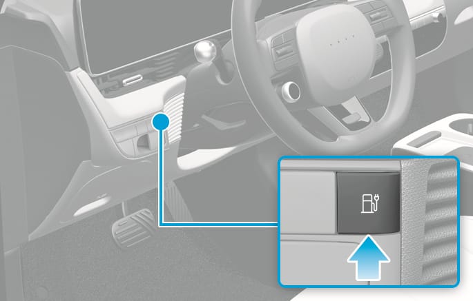 Hyundai manual illustration of the IONIQ 5 instrument-panel charging-door button