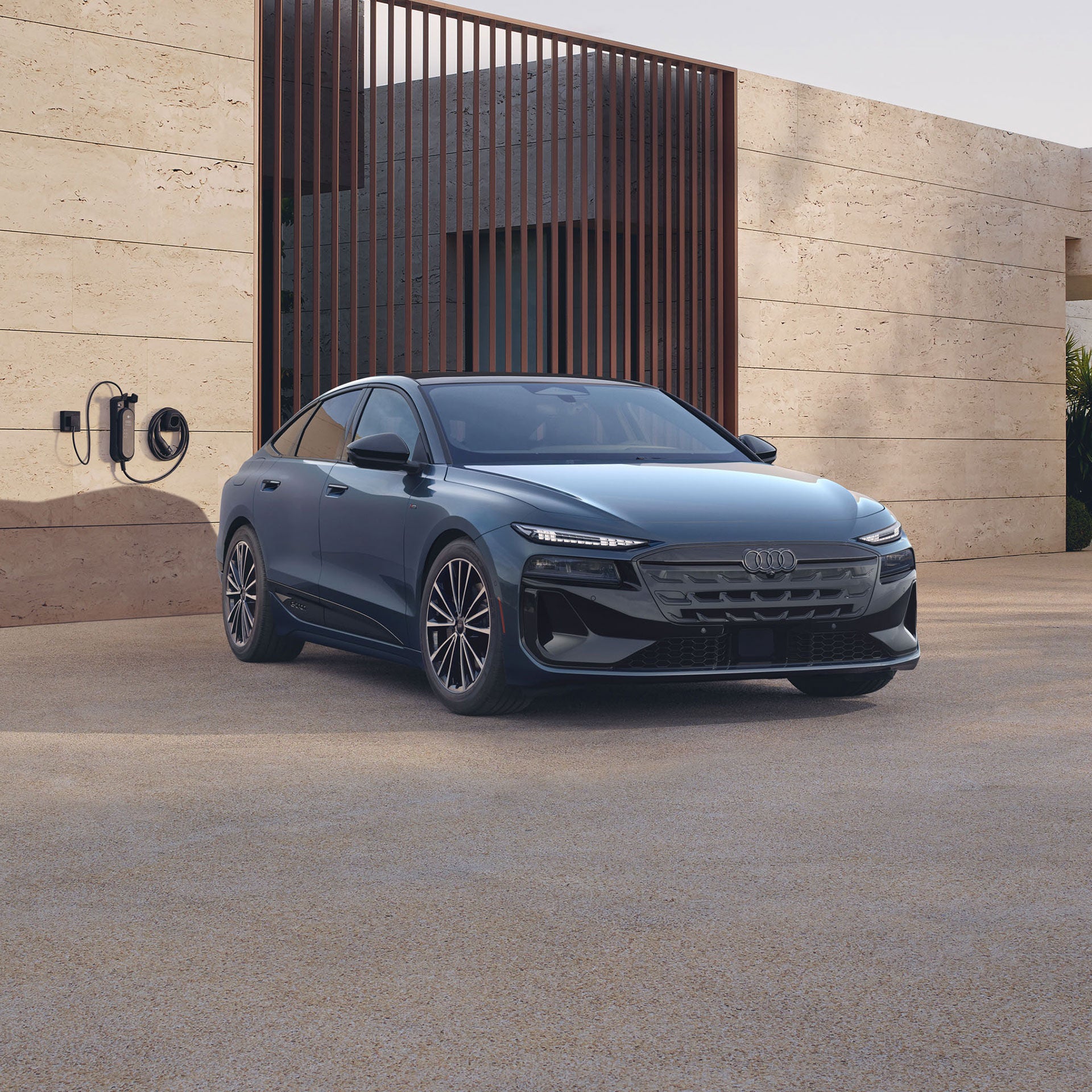2027 Audi A6 Sportback e-tron official front three-quarter charging image