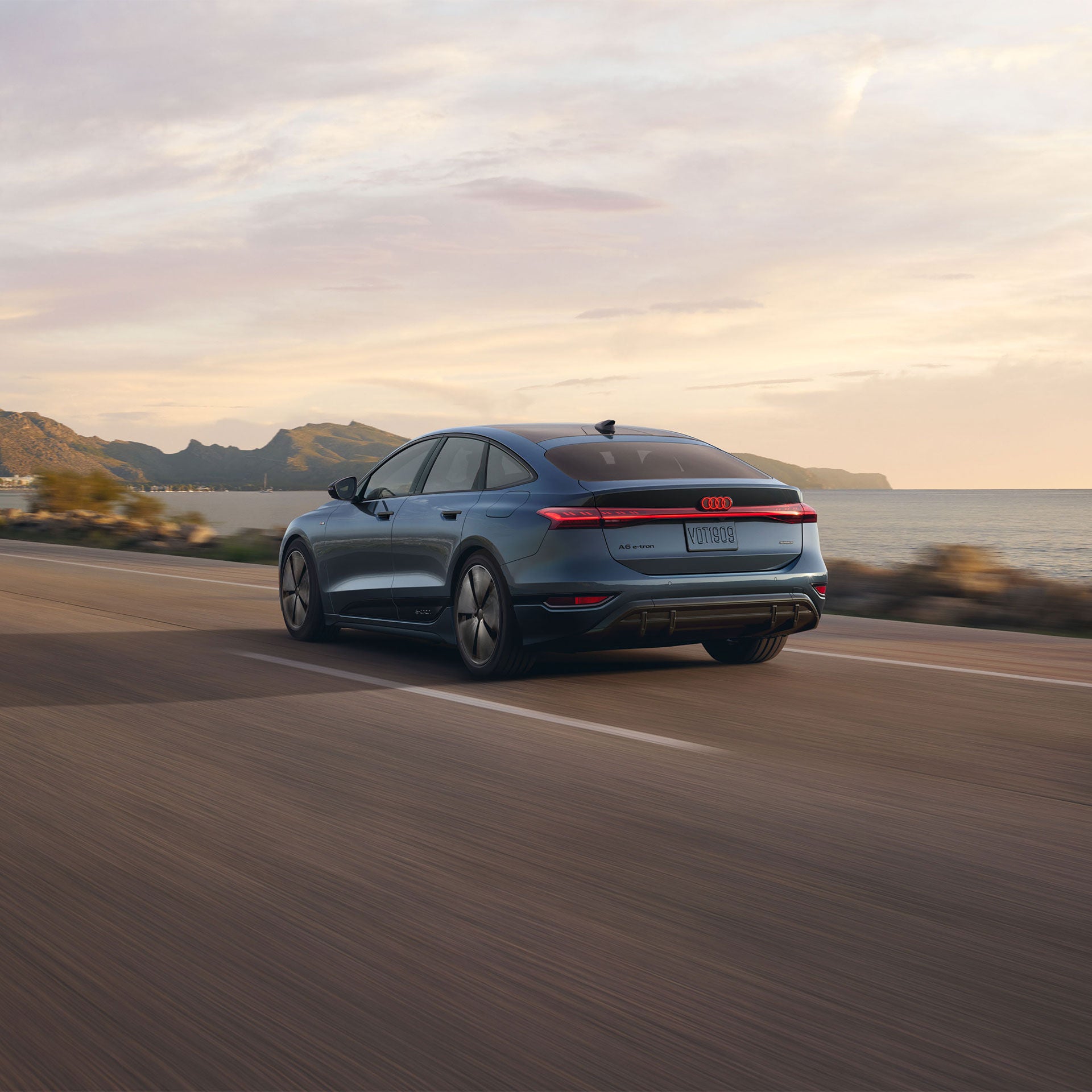 2027 Audi A6 Sportback e-tron official rear three-quarter rolling image