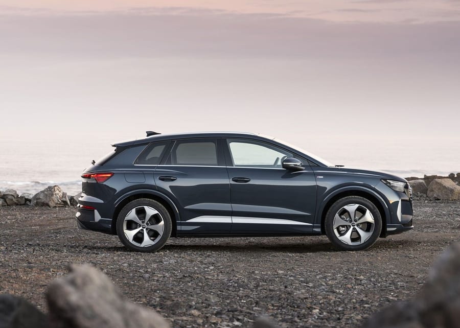 Audi Q4 SUV e-tron side profile on rocky terrain