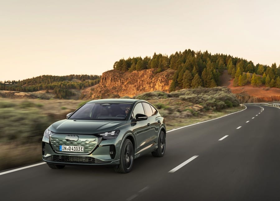 Audi Q4 Sportback e-tron driving on a forest road