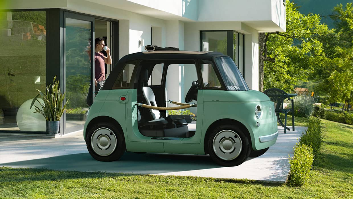 Official Fiat USA image of a mint green Fiat Topolino used for a buyer guide about the low-speed electric vehicle