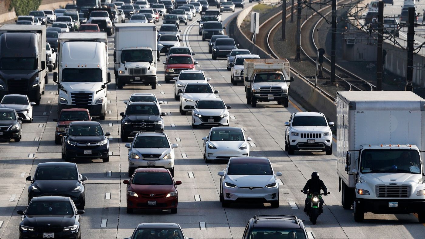 Traffic on a multilane highway, illustrating fuel consumption