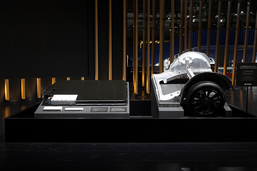 Lexus display showing battery and gigacast body structure components