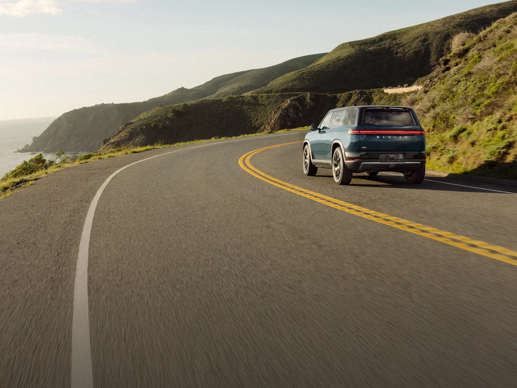 Rivian R2 electric SUV charging in official Rivian imagery