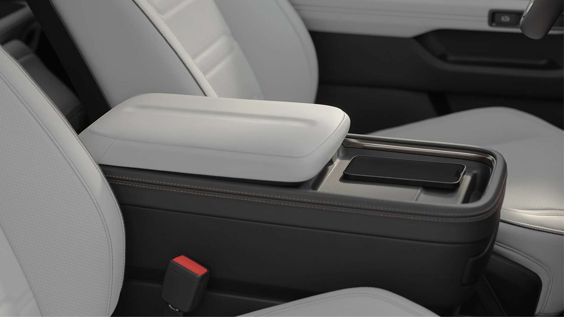 Rivian R2 center console and interior storage detail