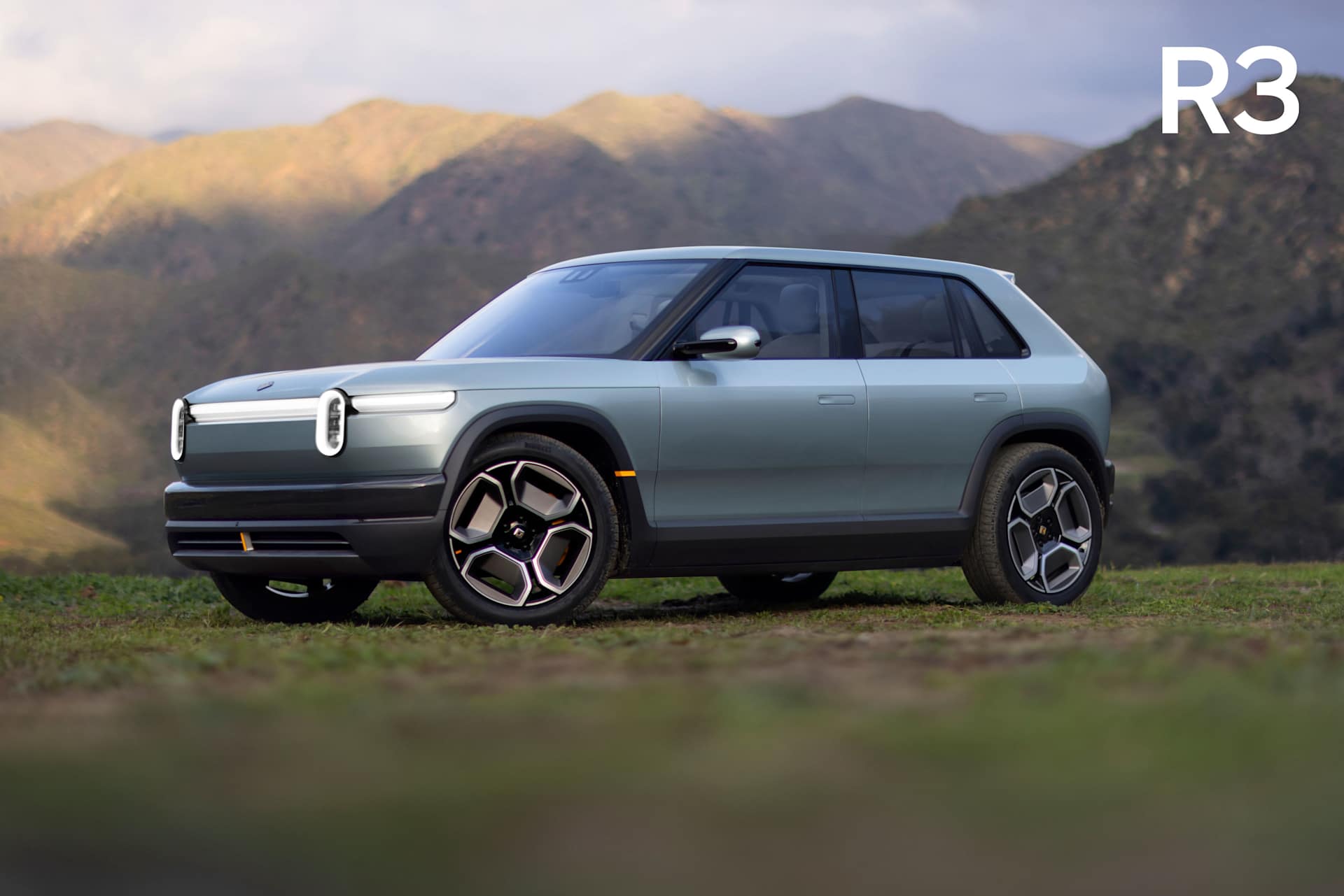Official Rivian image of the R3 electric crossover viewed from the front and side