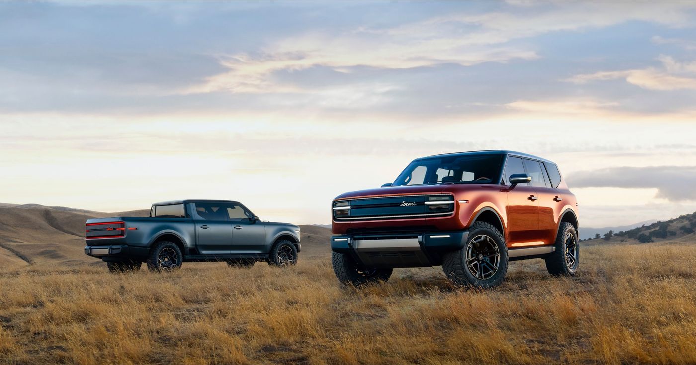 Scout Traveler SUV and Terra pickup official image in an outdoor setting